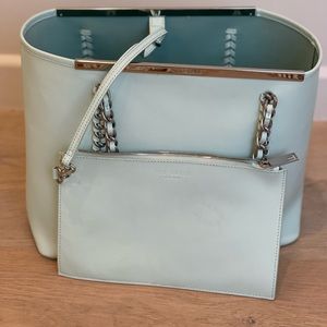 Ted Baker large robin’s egg blue tote with wrist pouch.